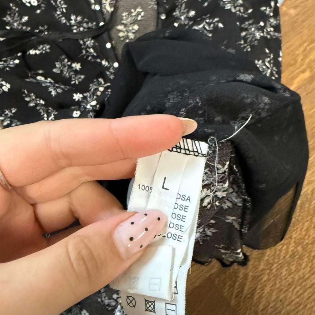 Black and white floral mesh top