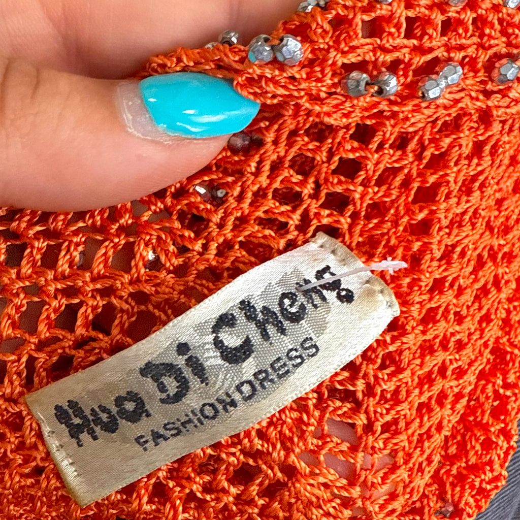 Orange crotchet detailed top