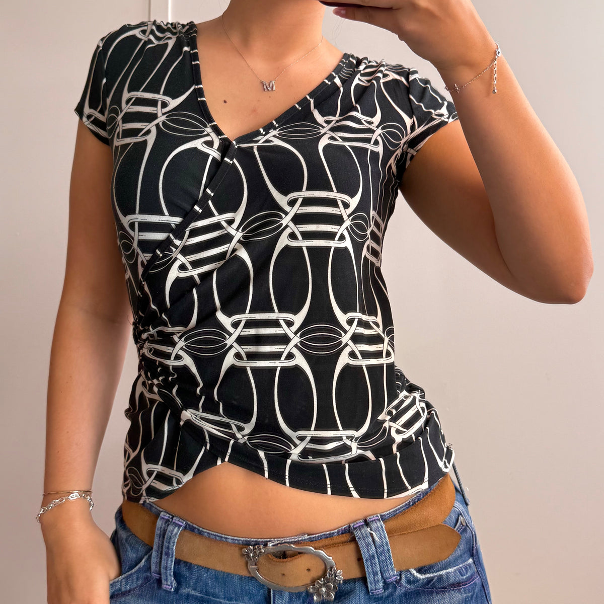 Black and white detailed wrap top