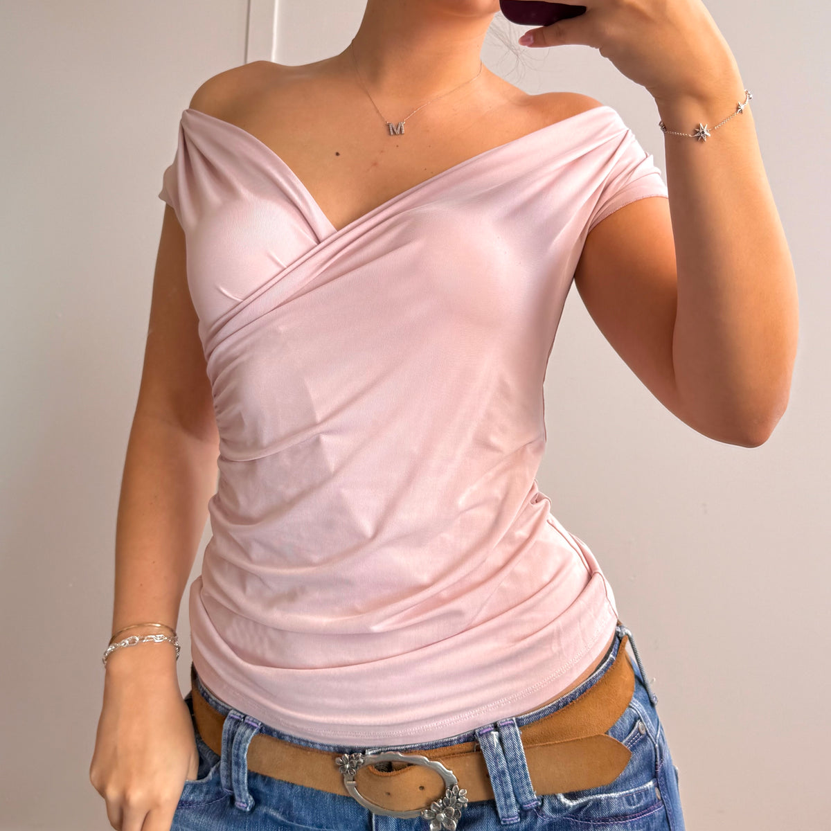 Pink wrapped slinky top
