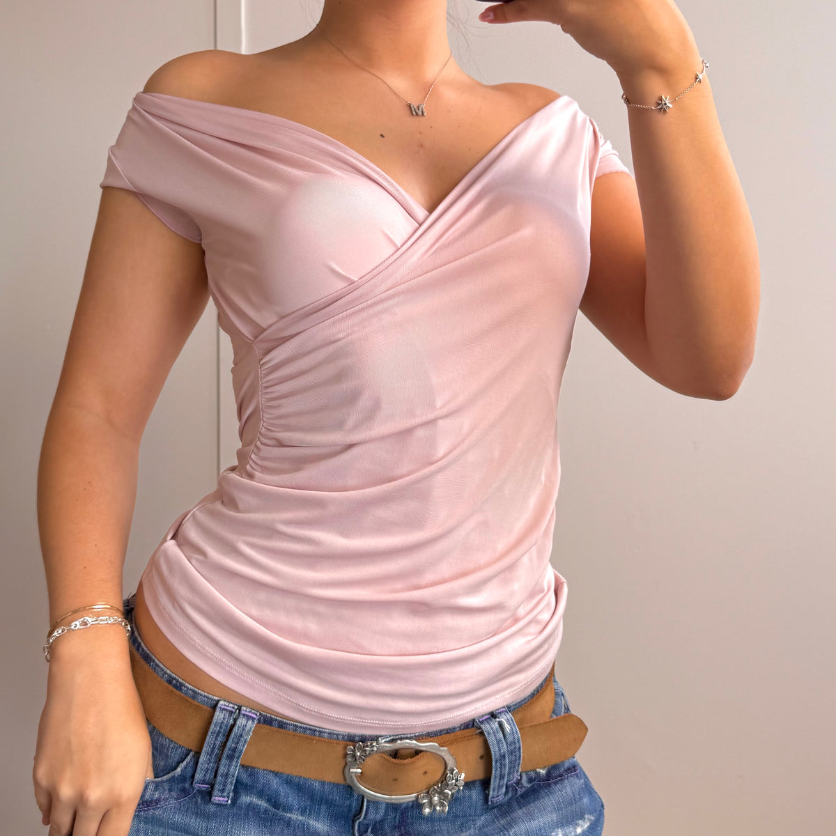 Pink wrapped slinky top
