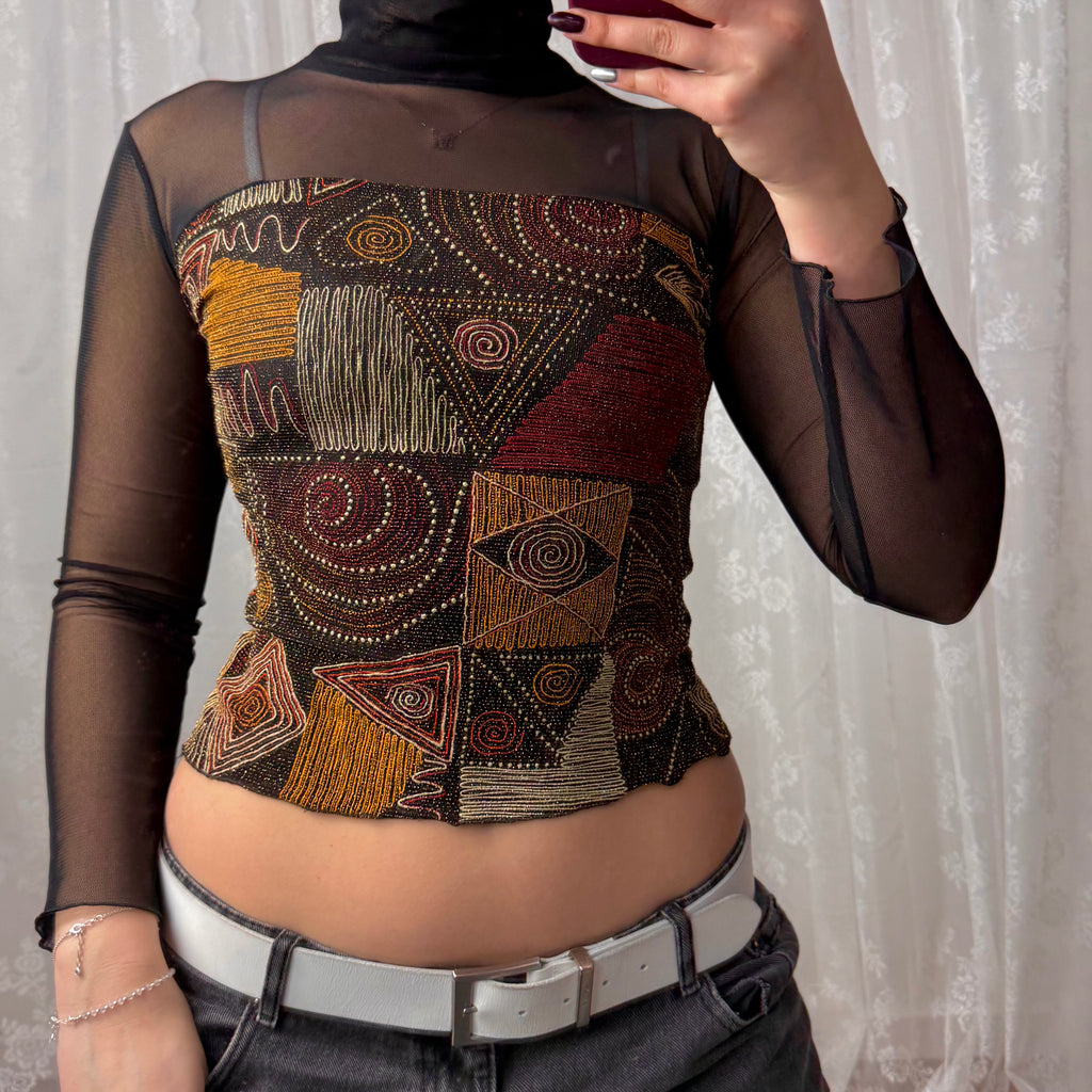 Black mesh long sleeved turtleneck with glittery pattern