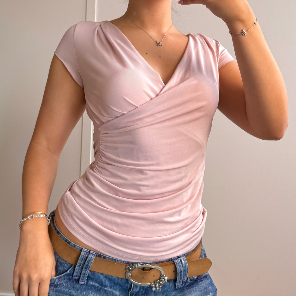 Pink wrapped slinky top