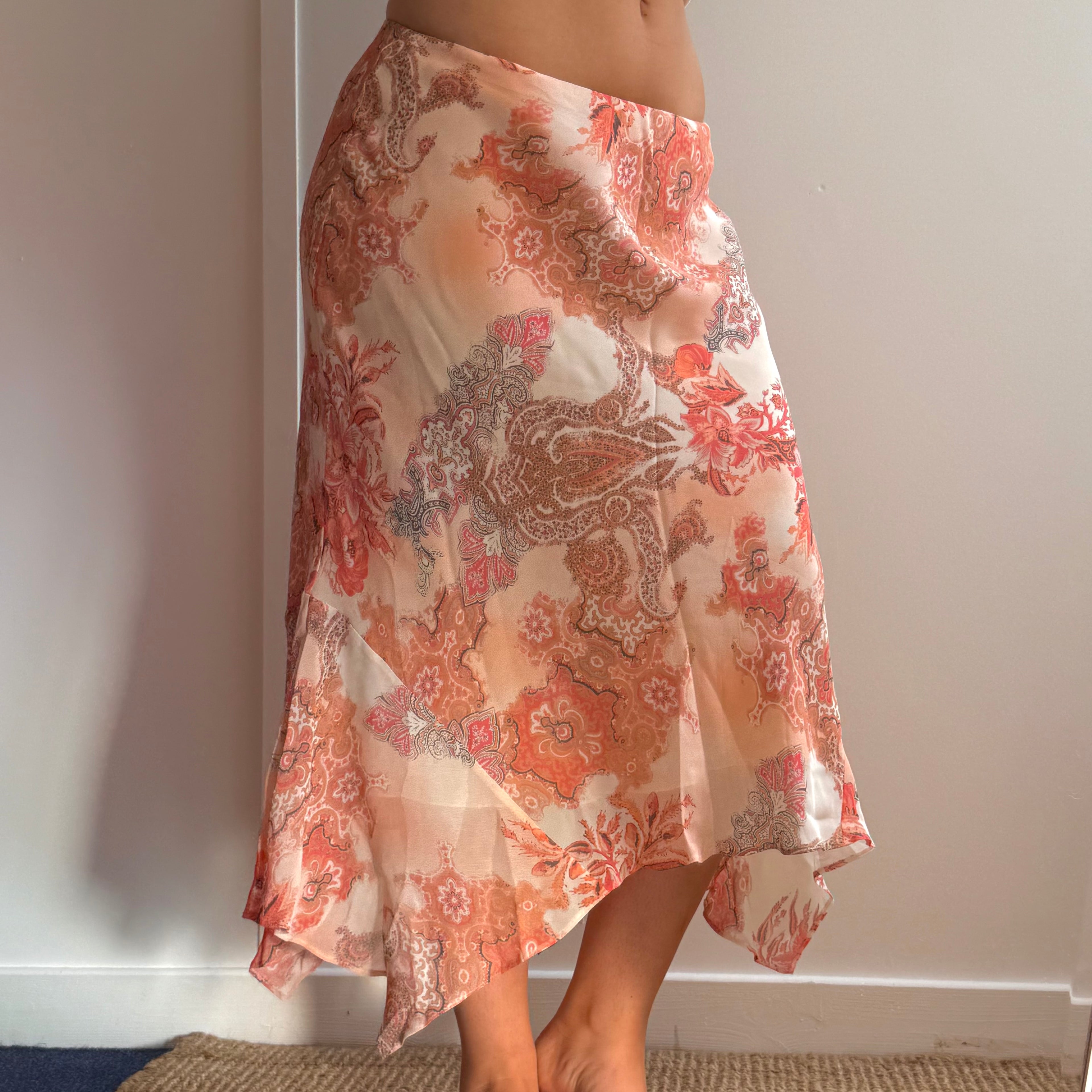 Orange paisley patterned mesh midi skirt