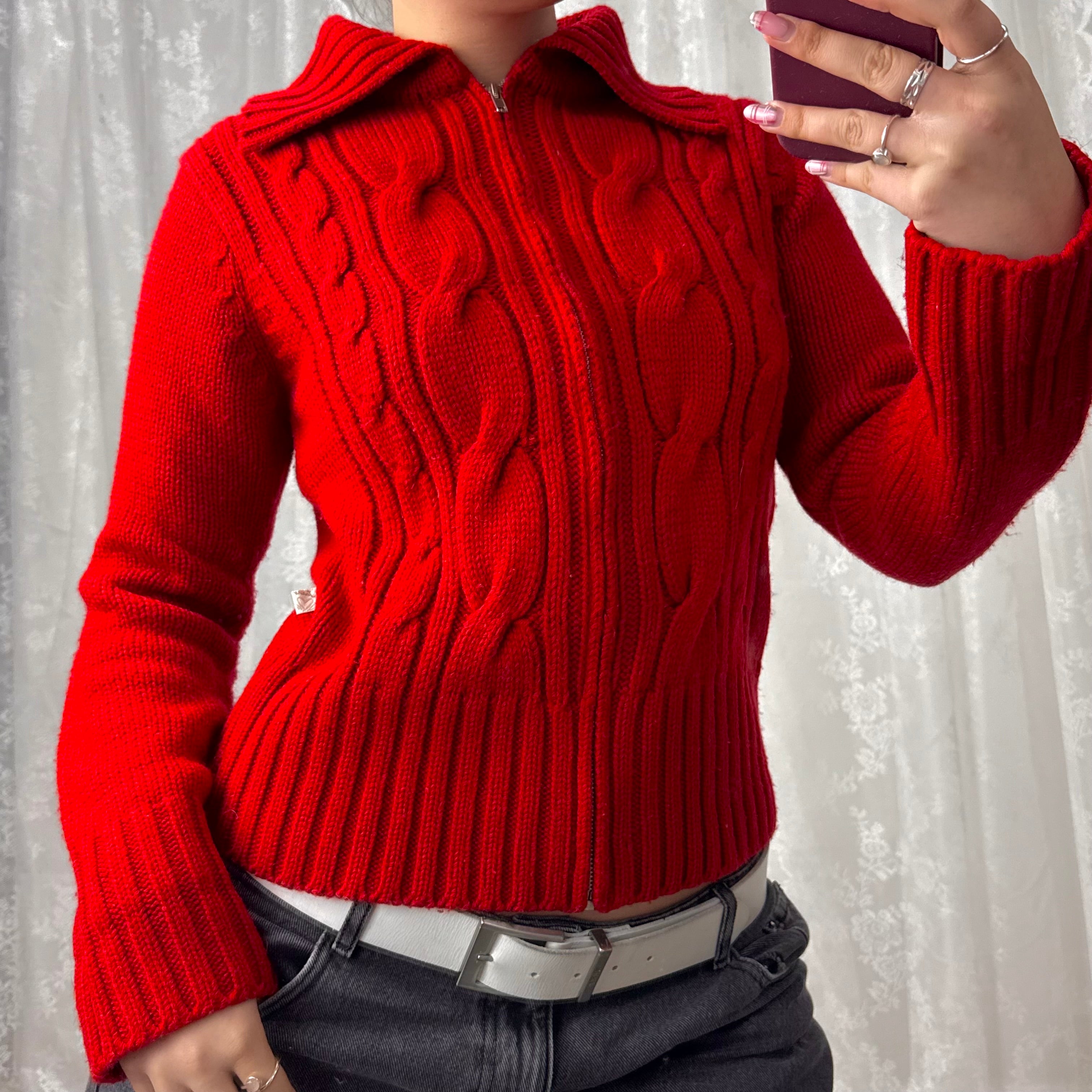 Red knitted zip up sweater