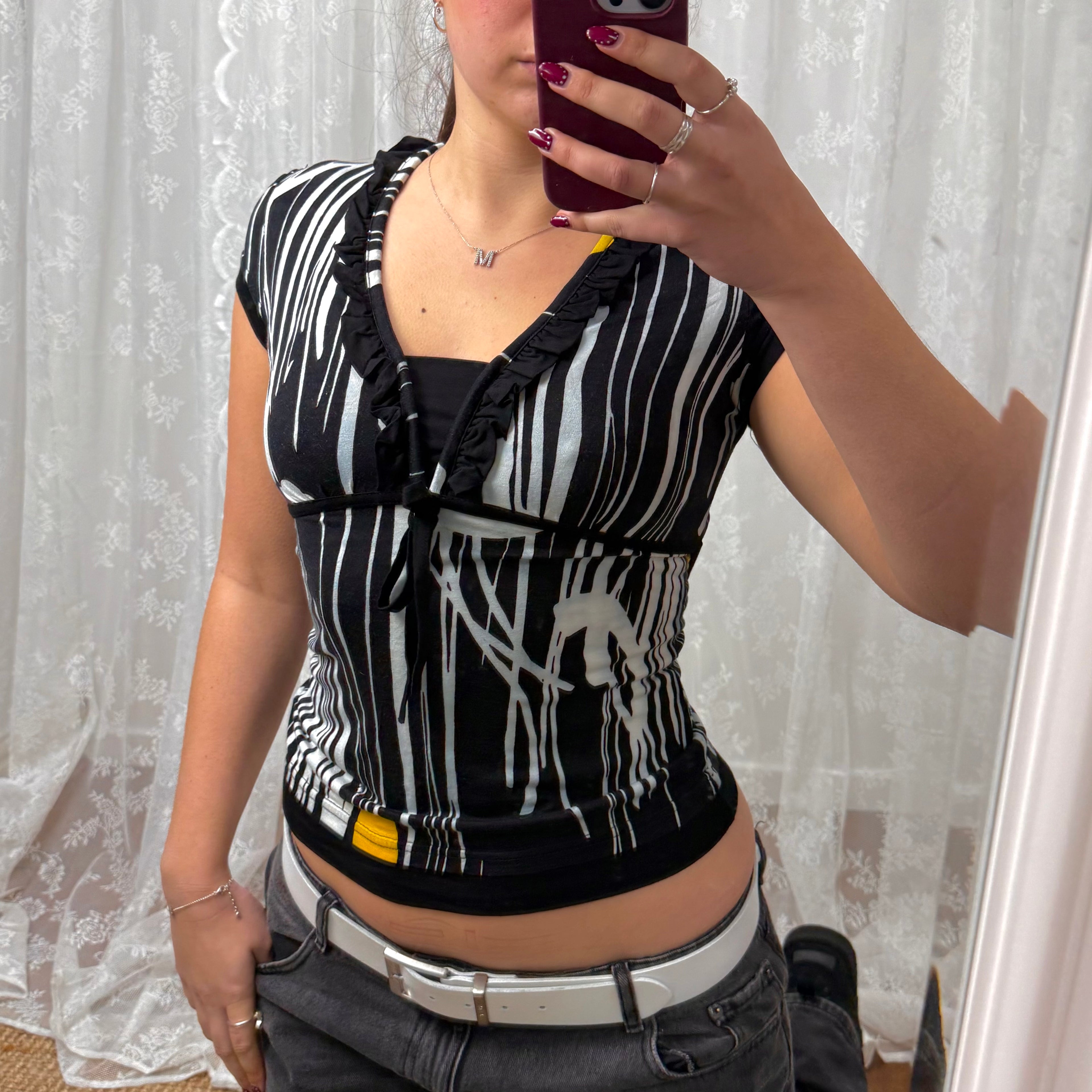 Black and white patterned top with tie back