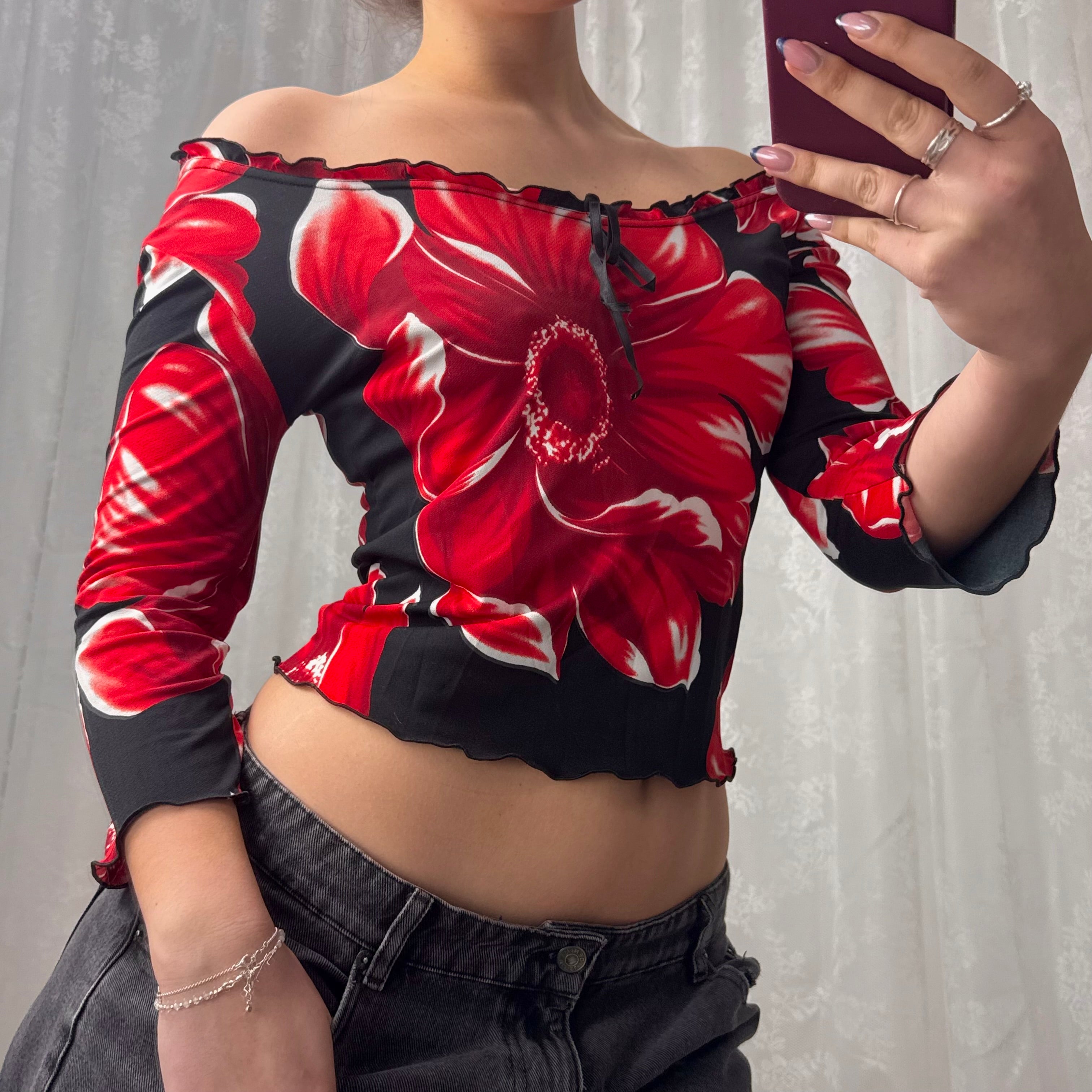 Red and black patterned off the shoulder top