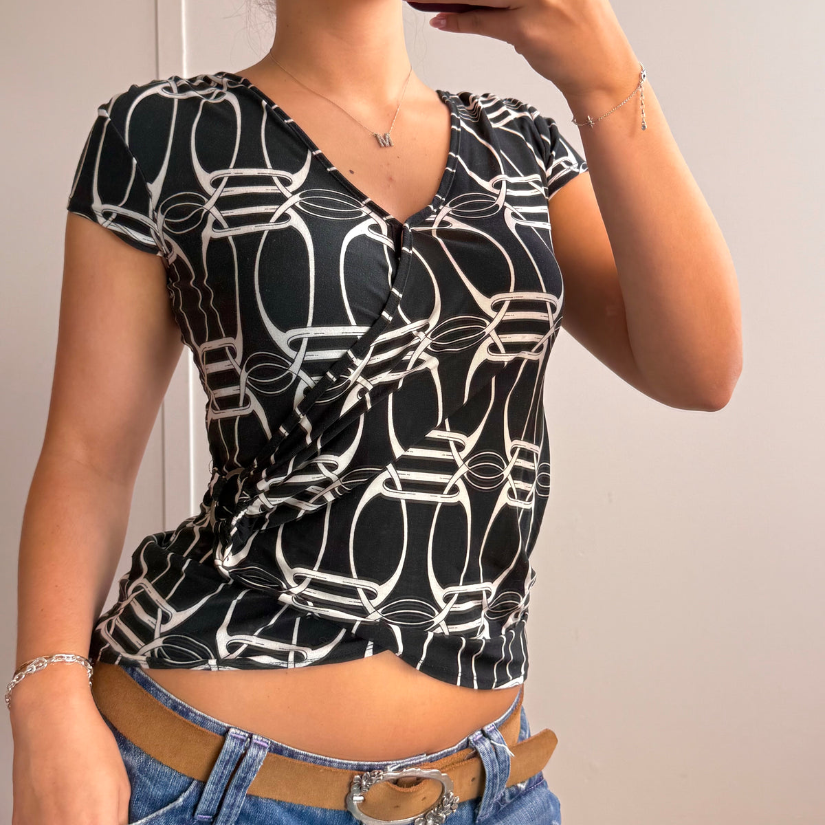 Black and white detailed wrap top