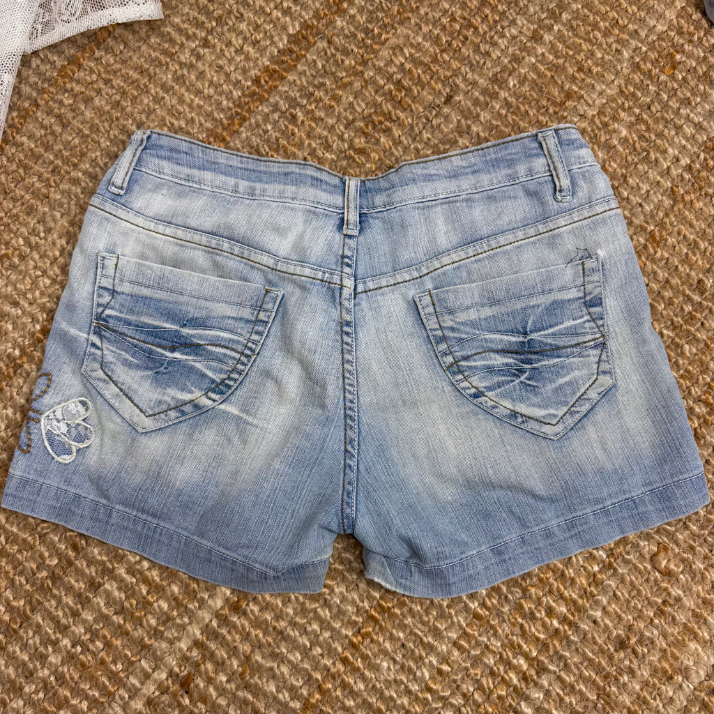 Blue denim shorts with embroidery detailing