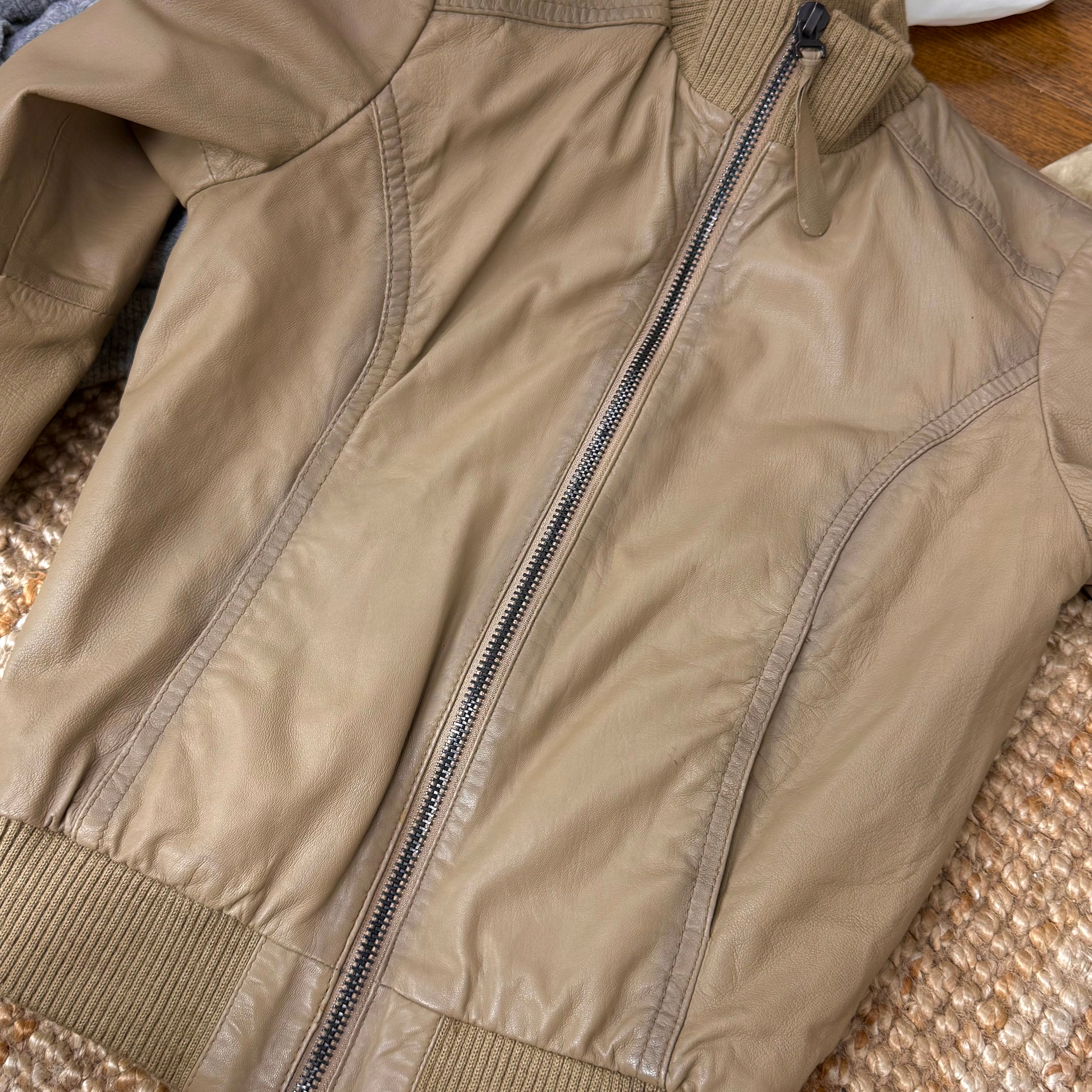 Beige leather bomber jacket