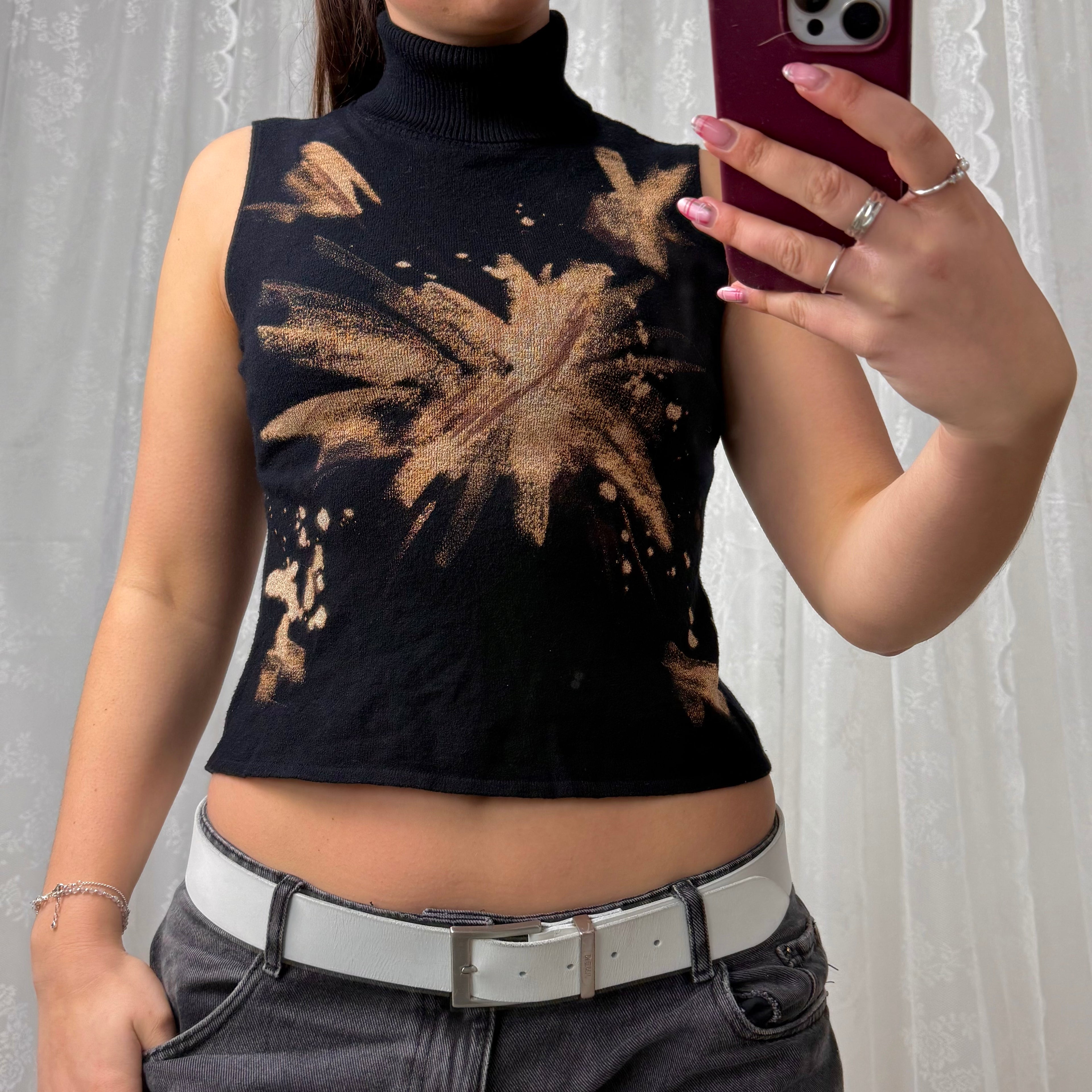 Black and brown patterned turtleneck