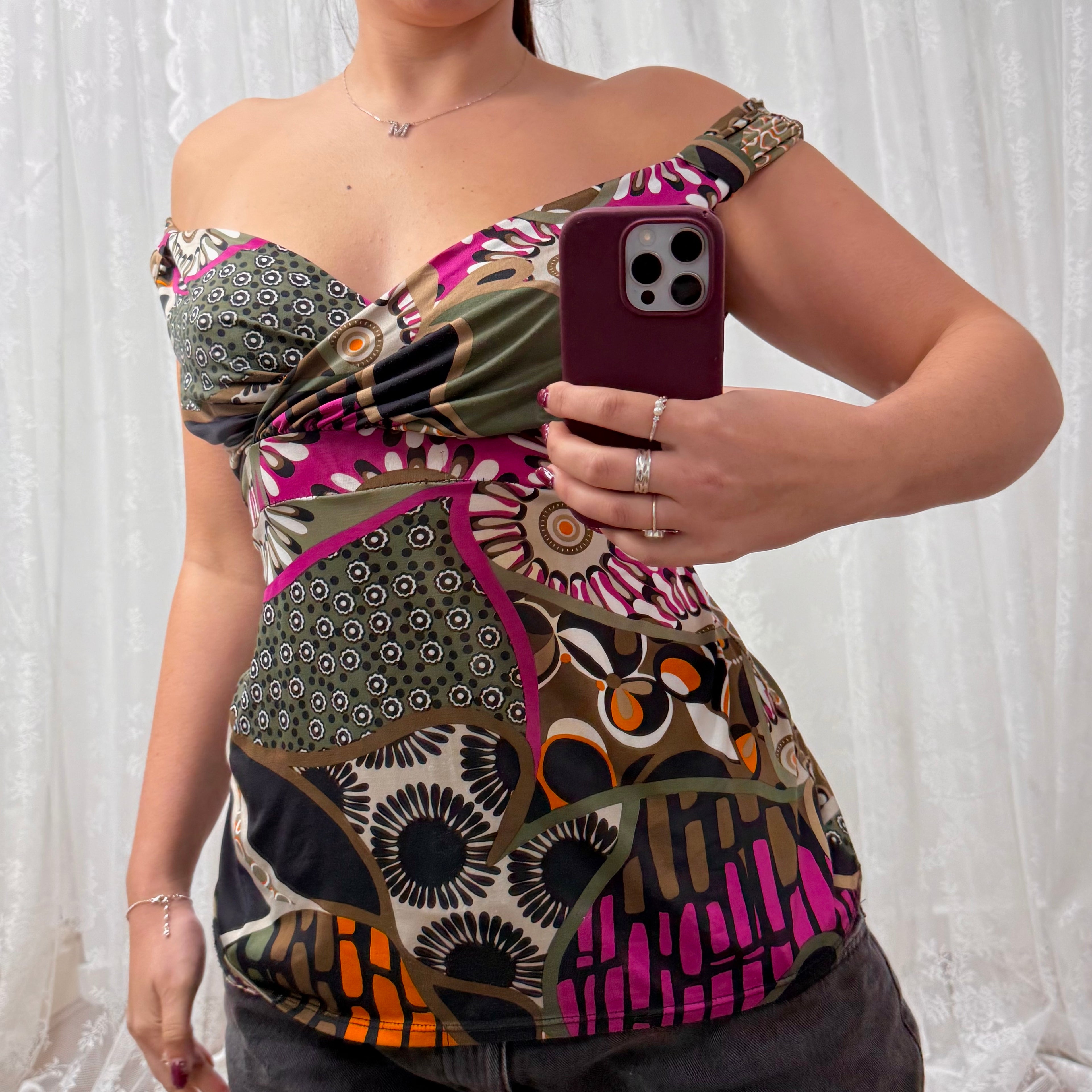 Green slinky patterned off the shoulder top