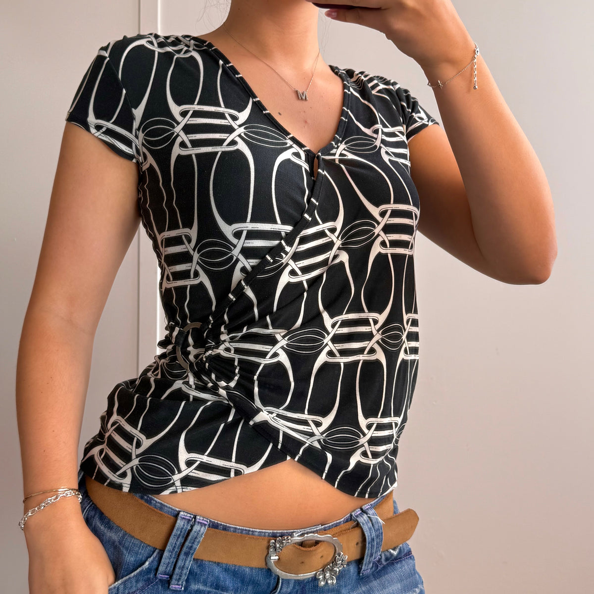 Black and white detailed wrap top