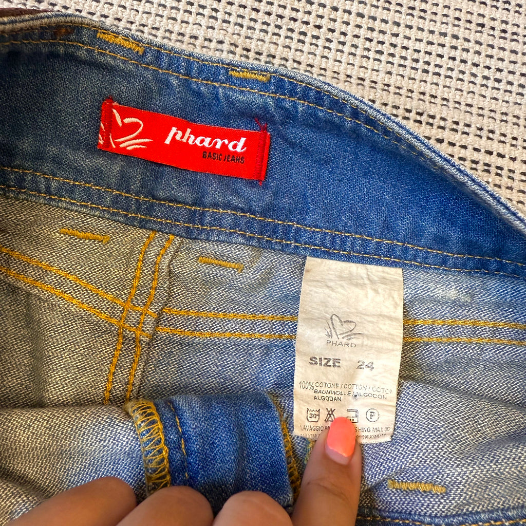 Blue denim distressed stuffed mini skirt