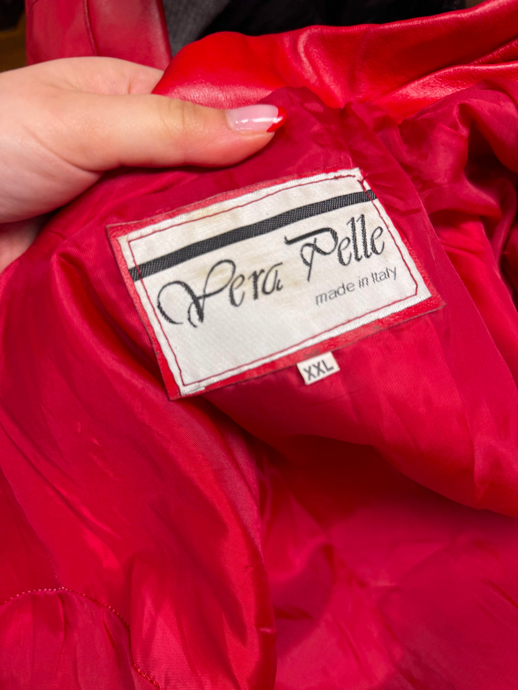 Red leather zip up collared jacket