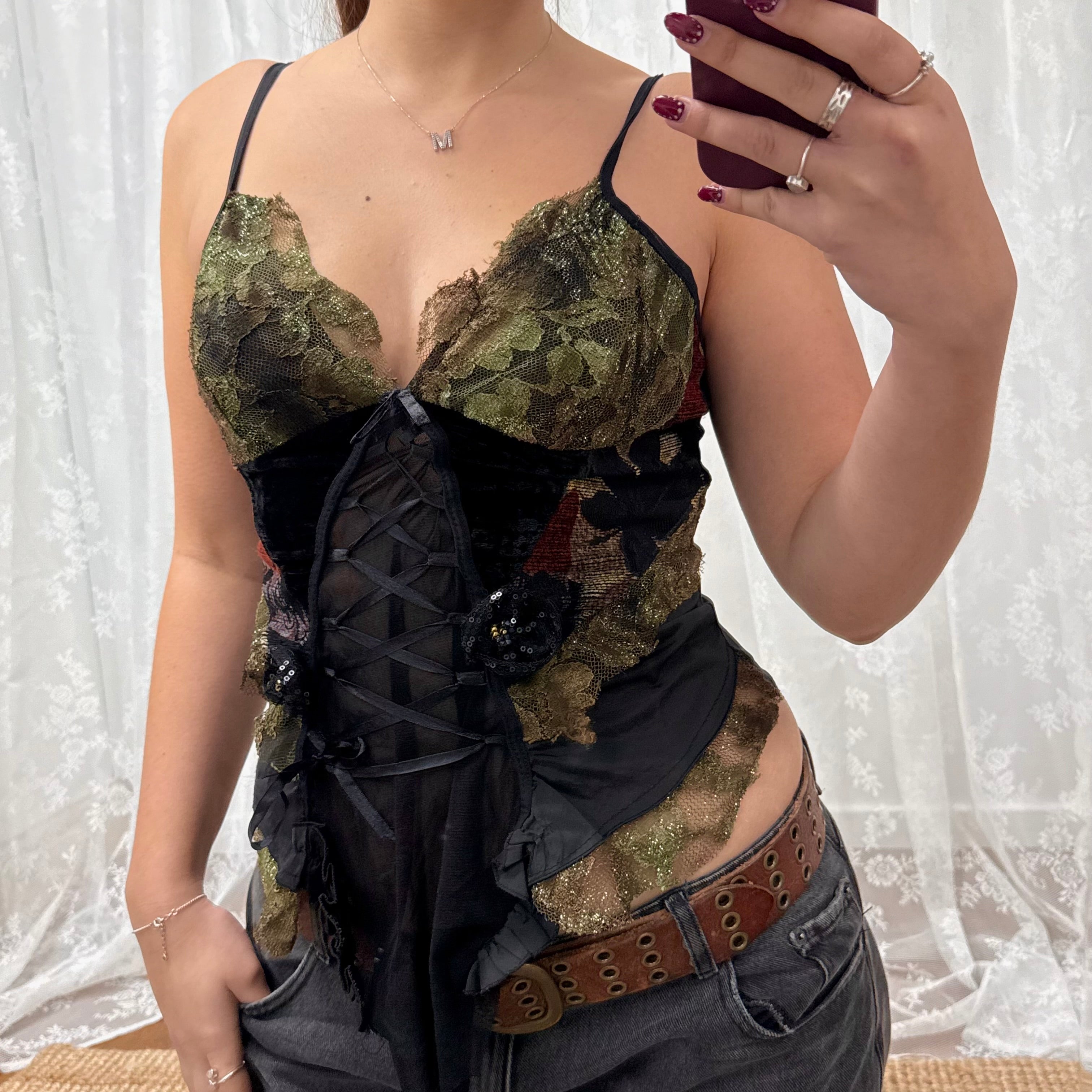 Black and green shiny corset style top