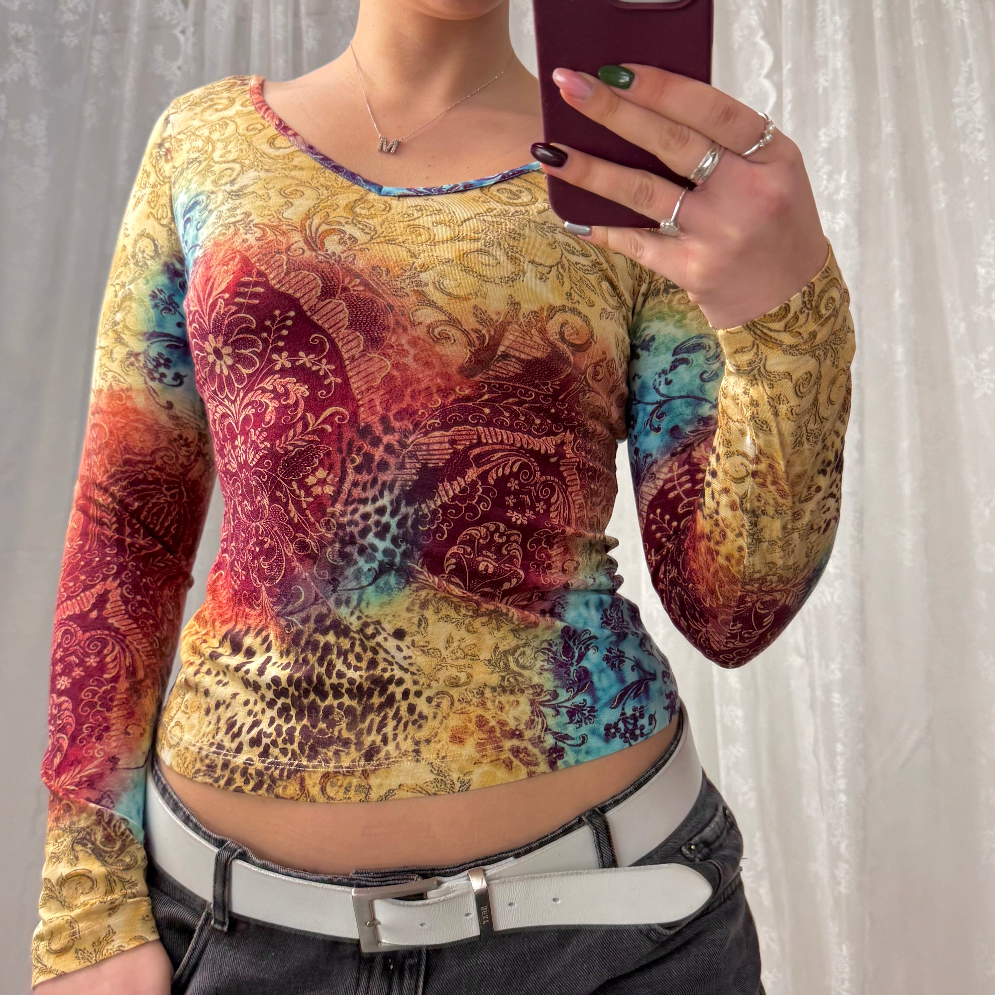 Multicoloured slinky patterned v neck long sleeved top