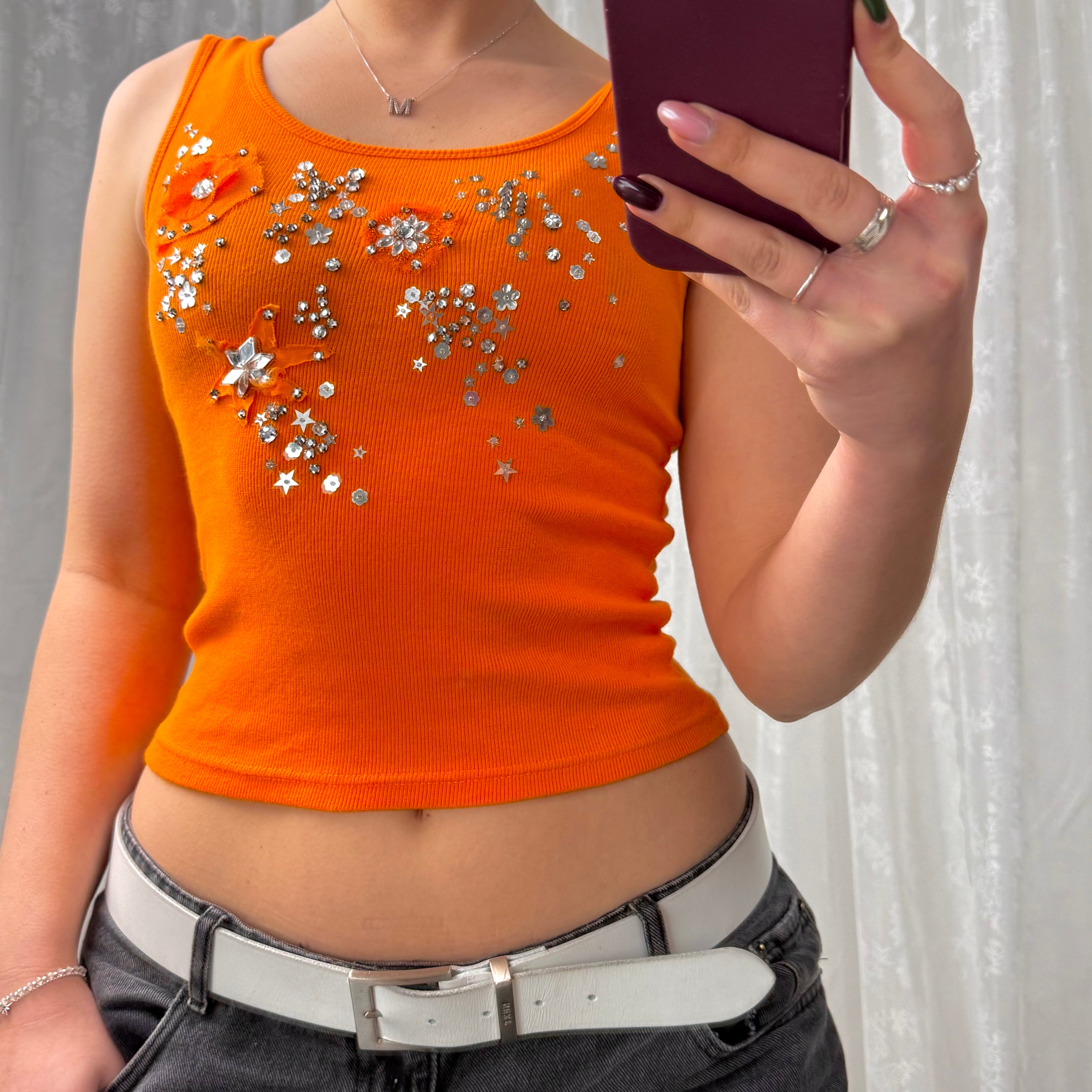 Orange rubbed and gem vest top