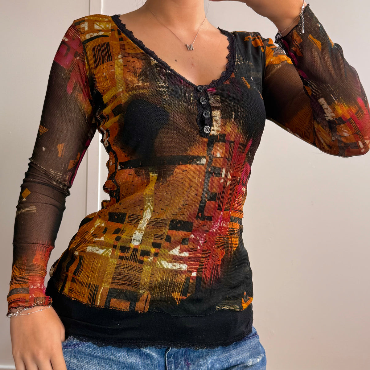Black mesh layered long sleeved top