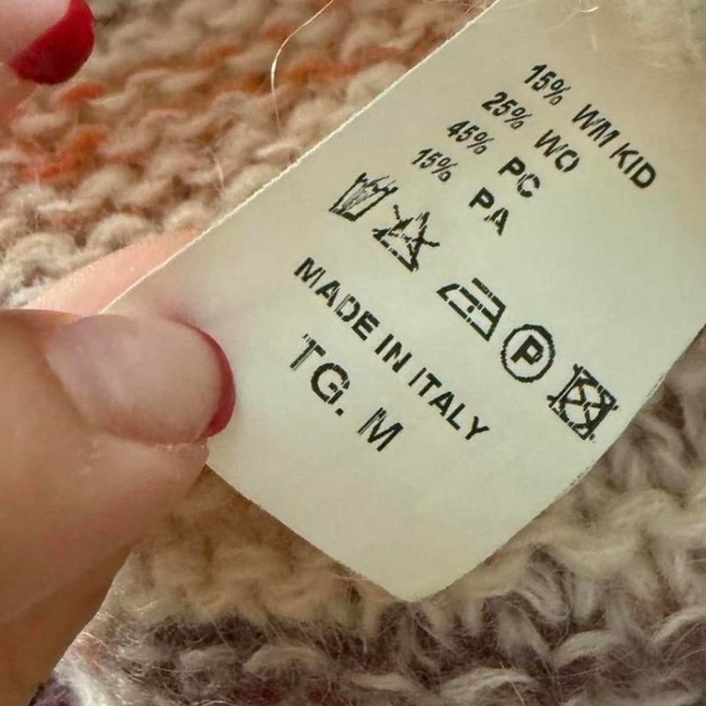 Orange and white patterned knit sweater with button up collar detail